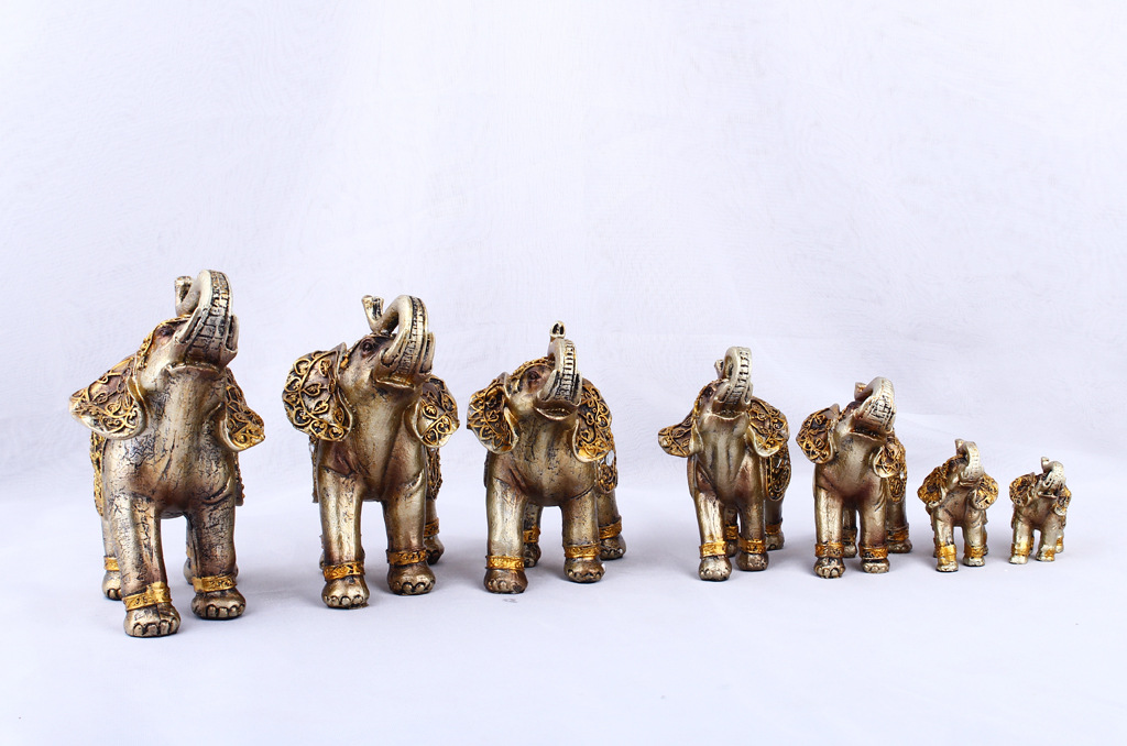 Golden seven elephants, artisanal resin ornaments, home decoration, crafts