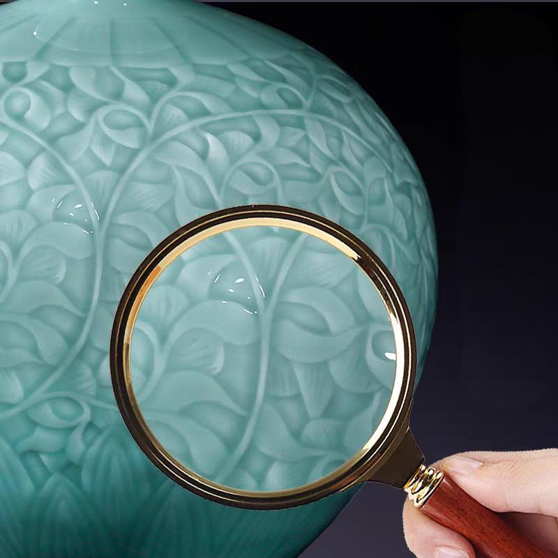 Handmade ceramic vase, green glaze, relief, ornaments