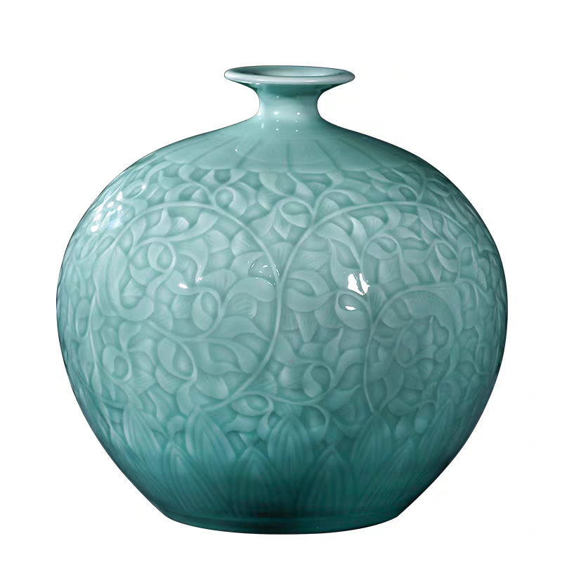 Handmade ceramic vase, green glaze, relief, ornaments