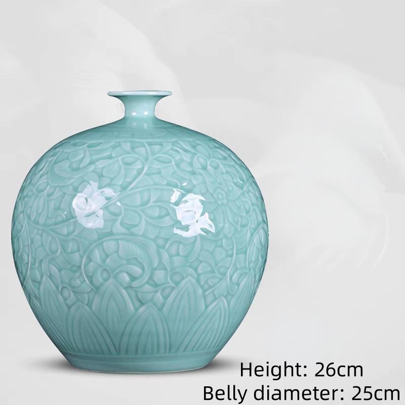 Handmade ceramic vase, green glaze, relief, ornaments