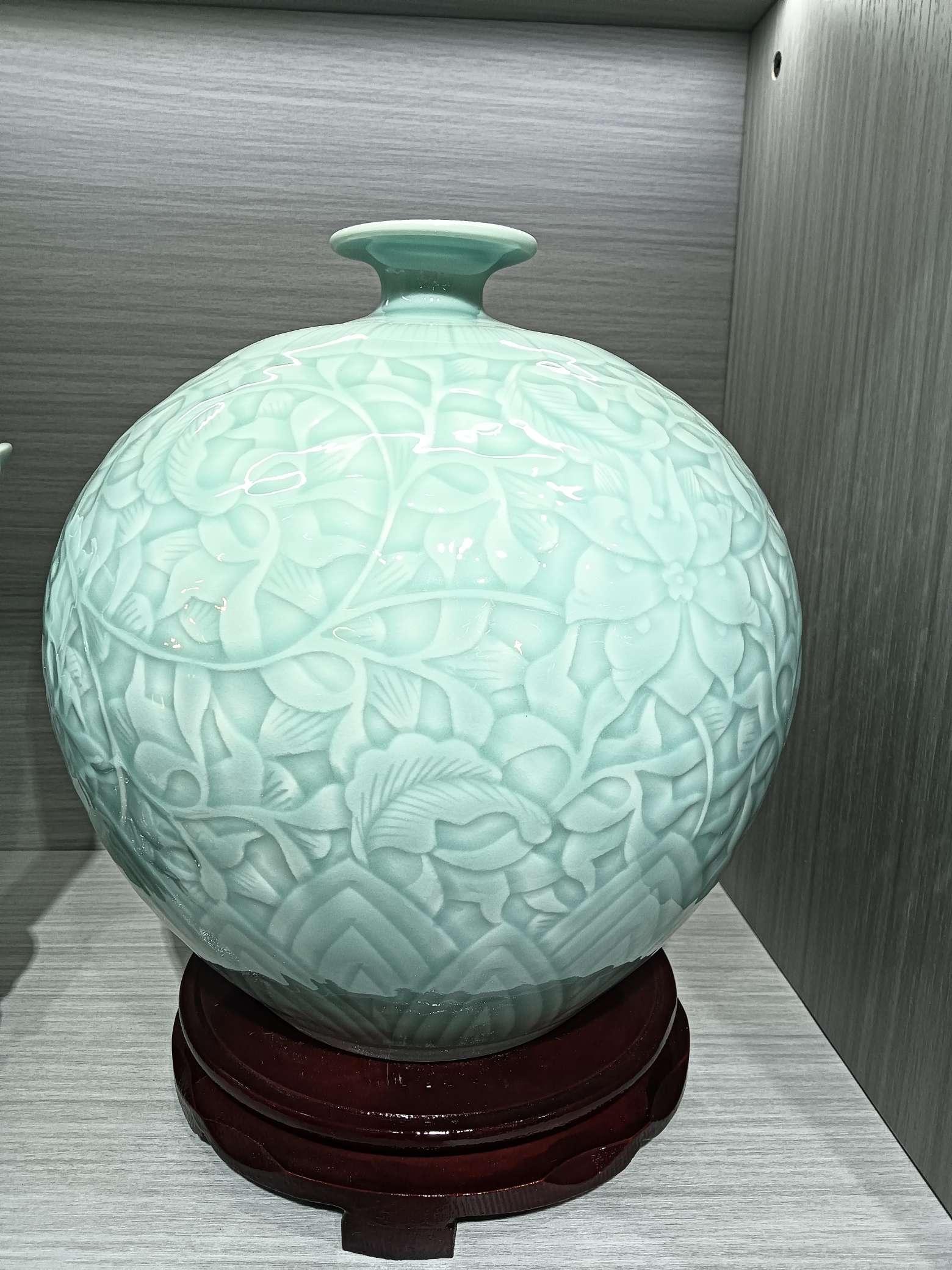 Handmade ceramic vase, green glaze, relief, ornaments